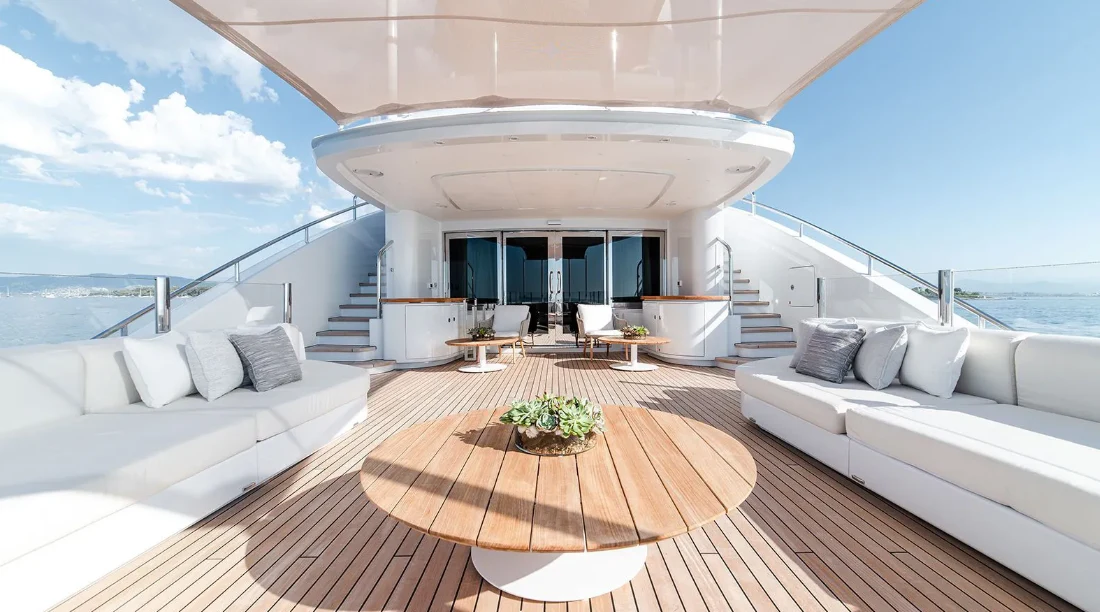 a room with a balcony and a pool aboard ALI BABA Yacht for Sale
