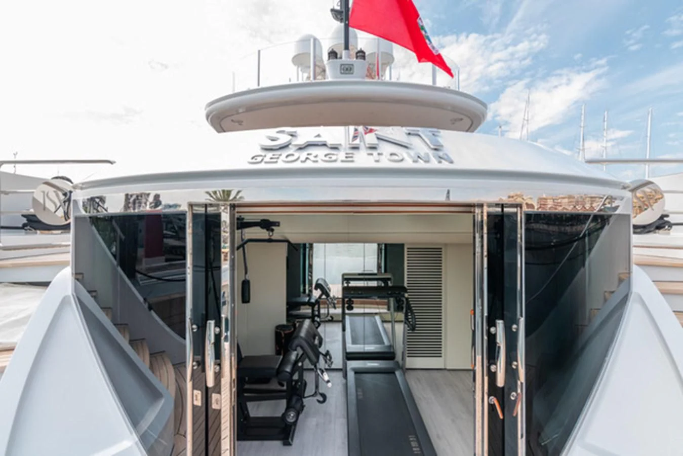 a bicycle on a ladder aboard ALI BABA Yacht for Sale