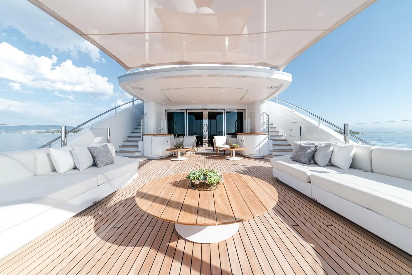 a room with a couch and a table and a pool aboard ALI BABA Yacht for Sale