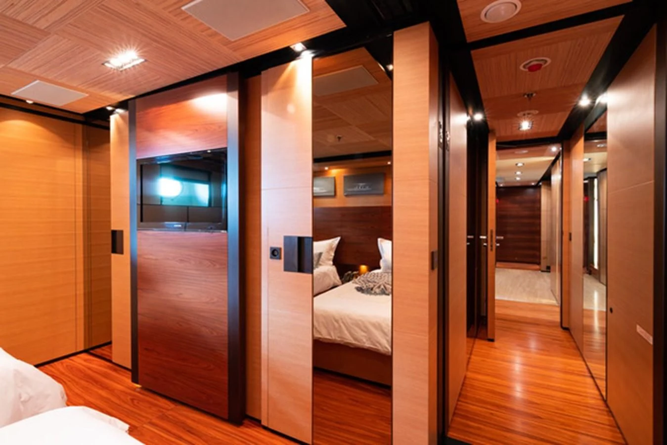 a room with a bed and a door aboard ALI BABA Yacht for Sale