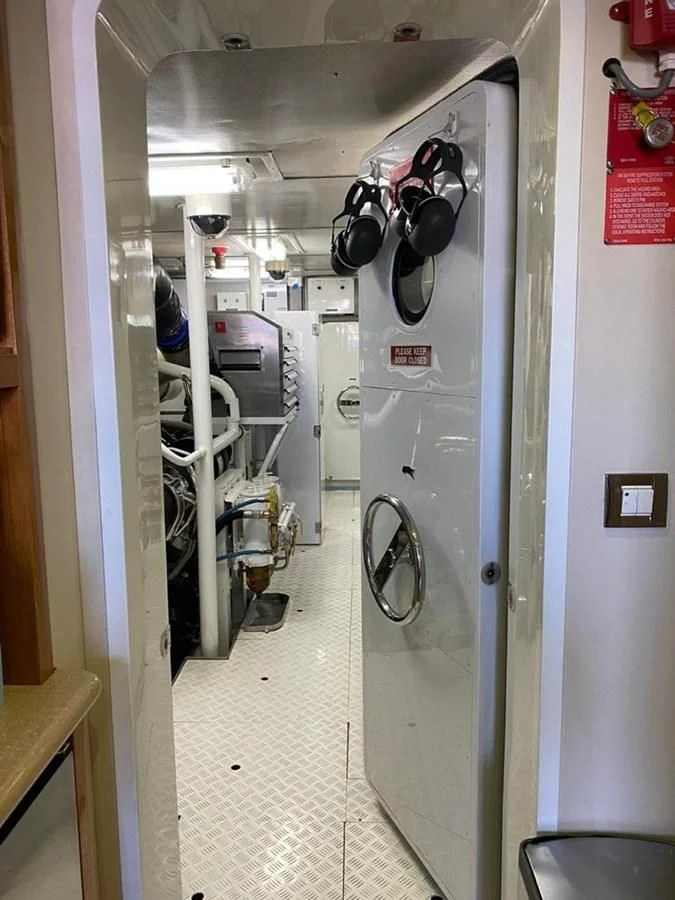 a hallway with white walls aboard BLUE STEELE Yacht for Sale