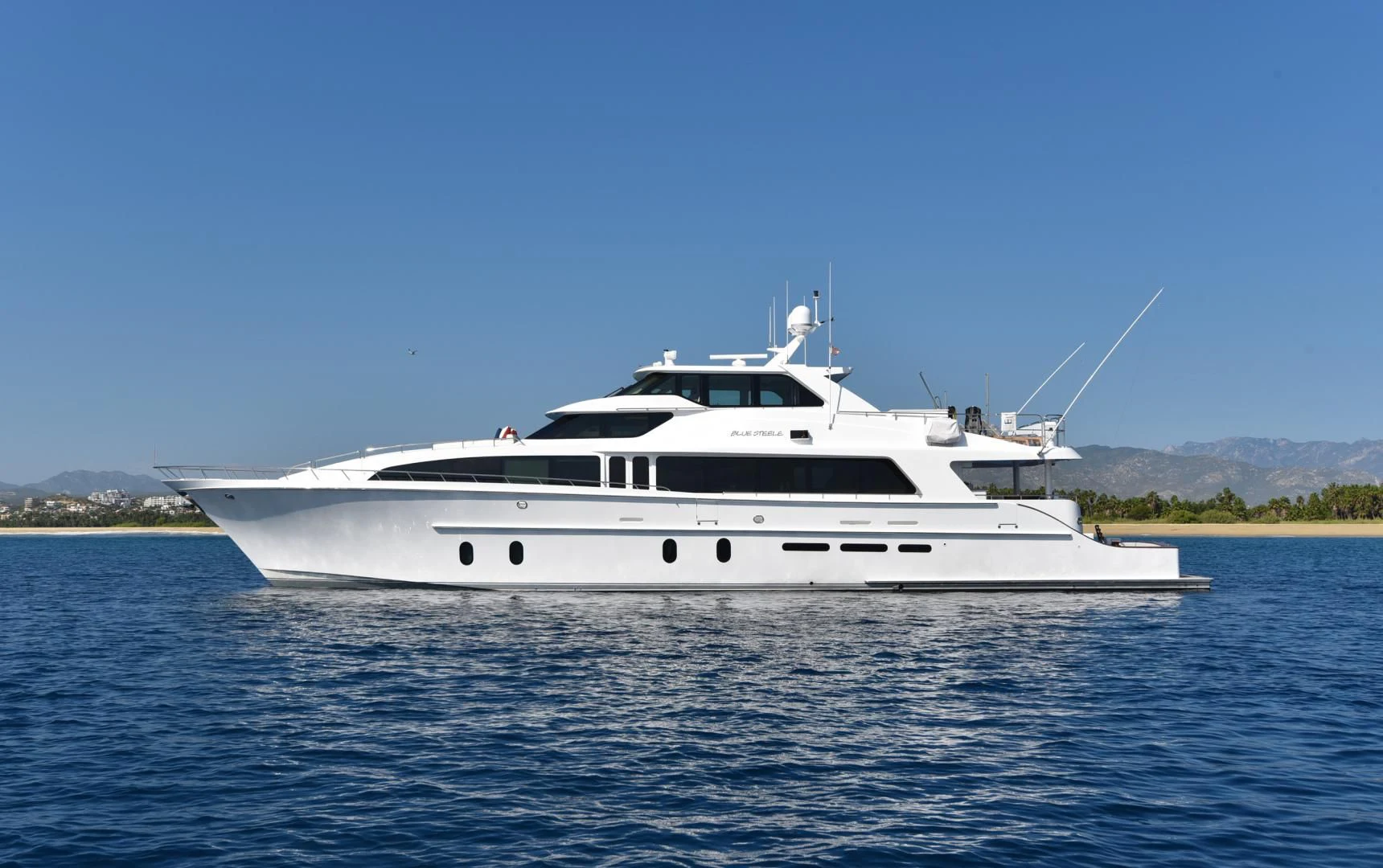 a white yacht in the water aboard BLUE STEELE Yacht for Sale