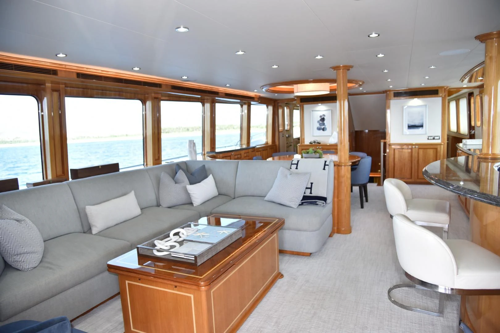 a living room with a couch and a table aboard BLUE STEELE Yacht for Sale
