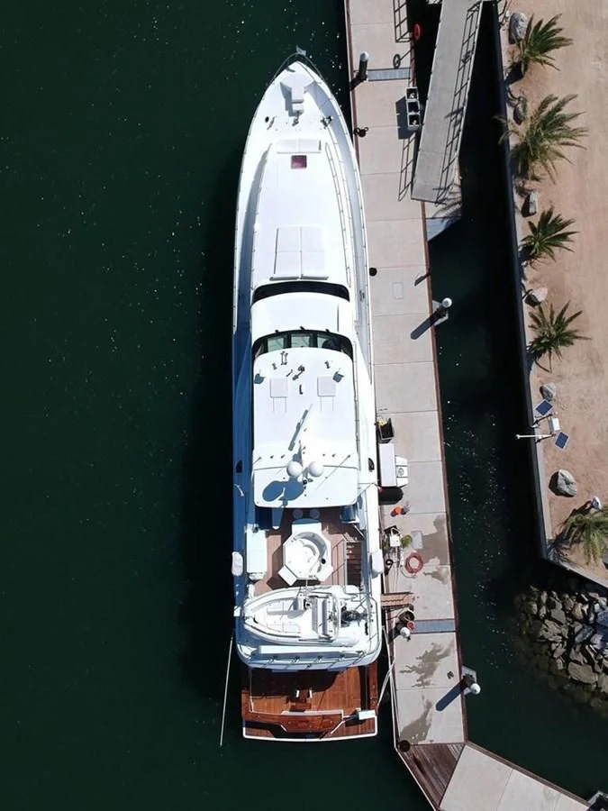 a white boat on a body of water aboard BLUE STEELE Yacht for Sale