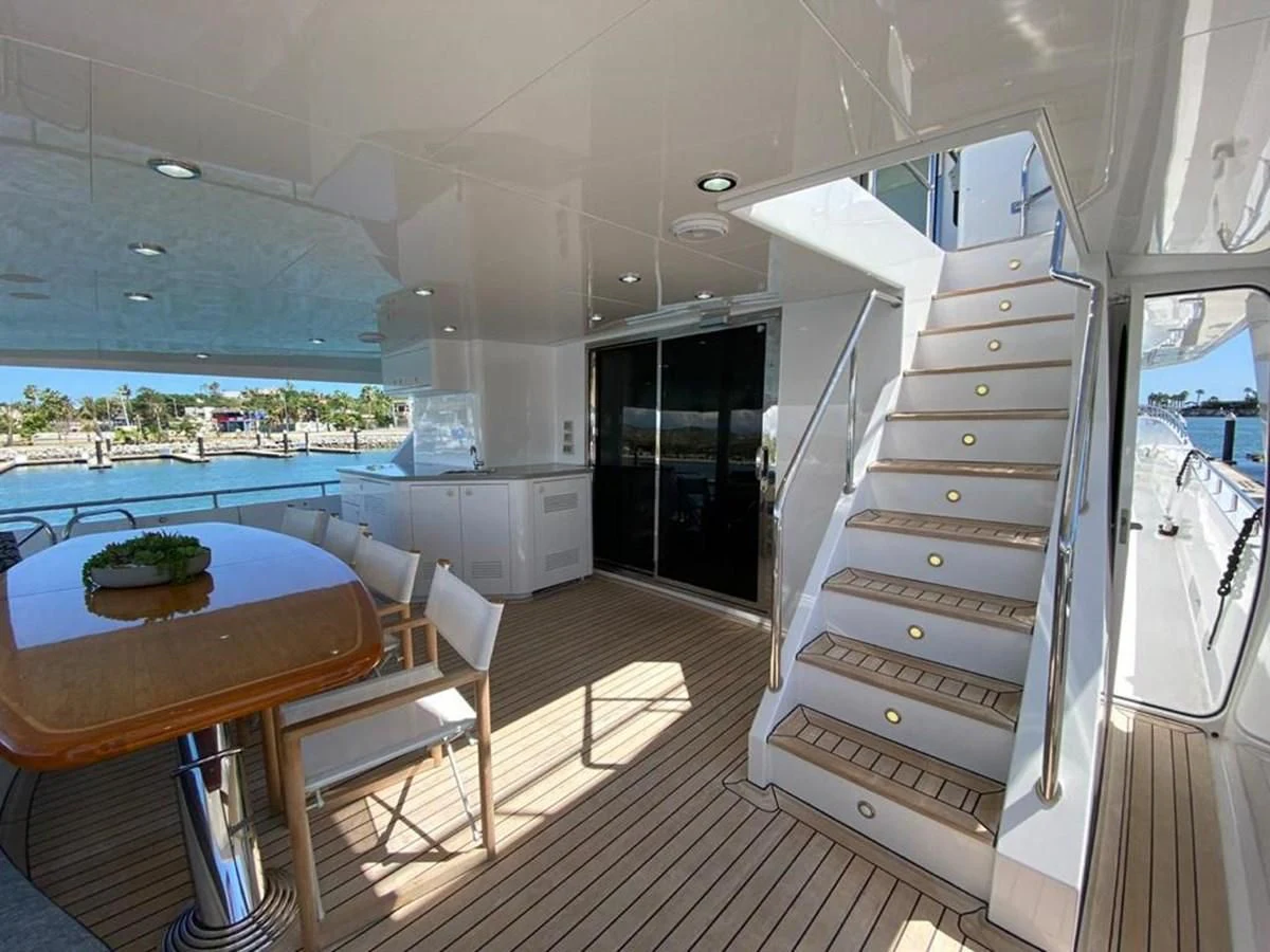 a room with a table and chairs aboard BLUE STEELE Yacht for Sale