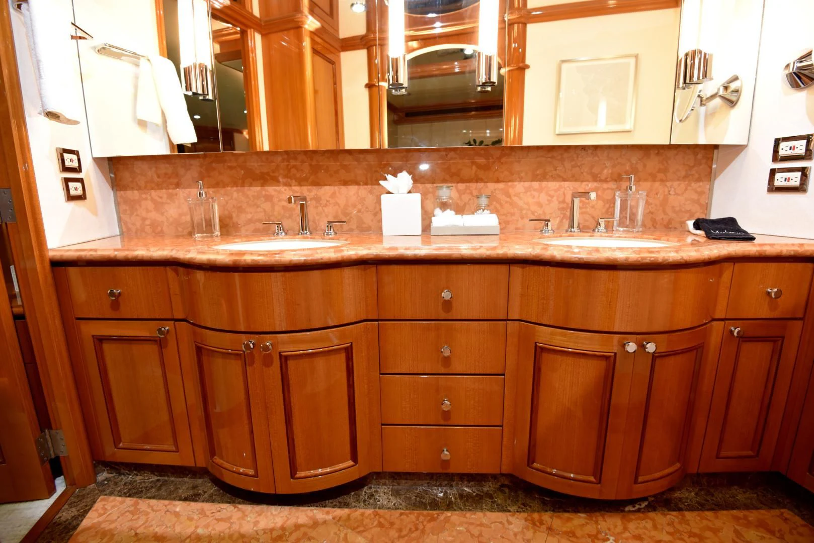 a kitchen with wooden cabinets aboard BLUE STEELE Yacht for Sale