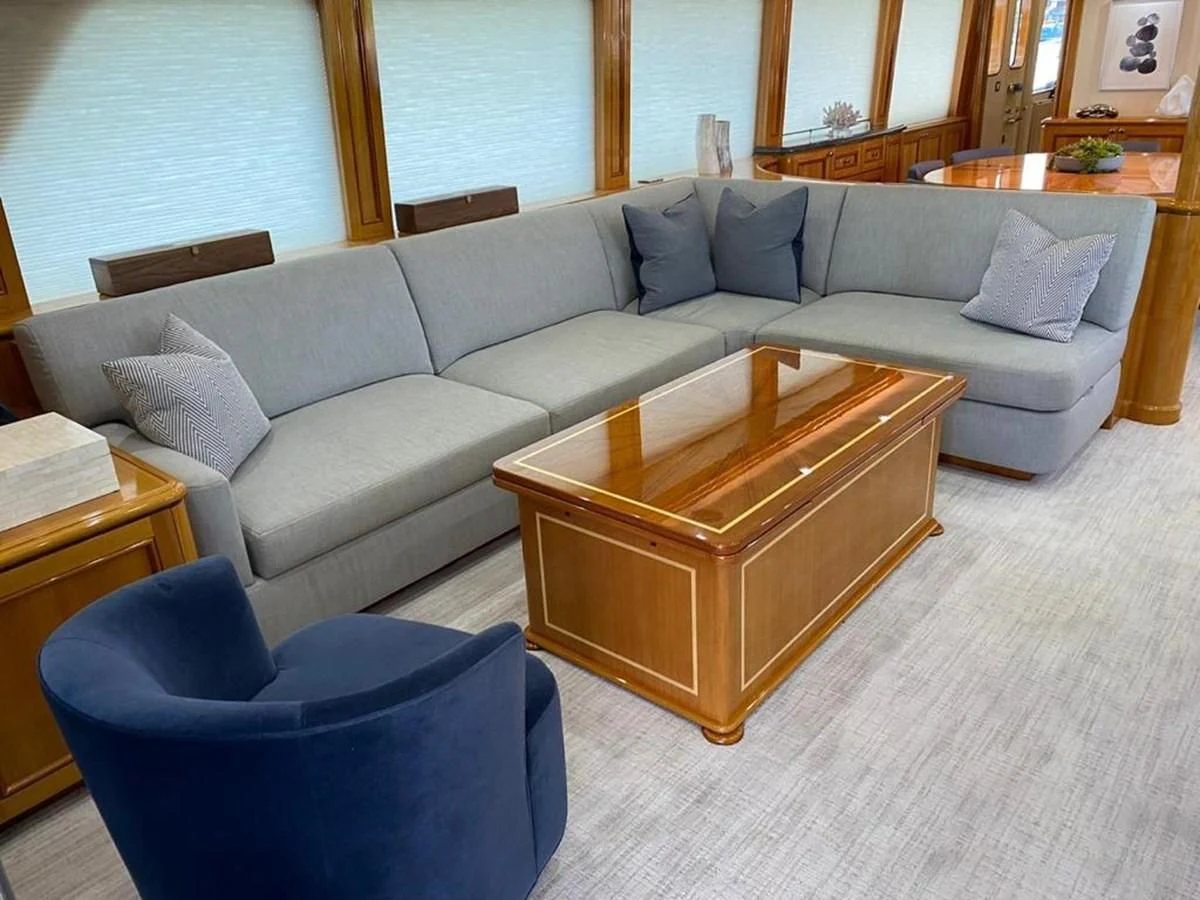 a couch in a living room aboard BLUE STEELE Yacht for Sale