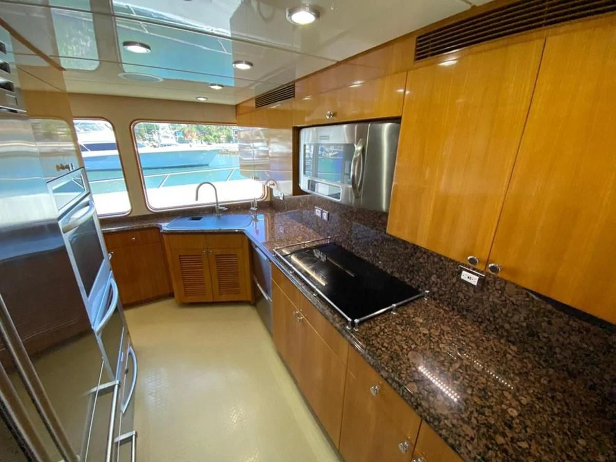 a kitchen with a large island aboard BLUE STEELE Yacht for Sale