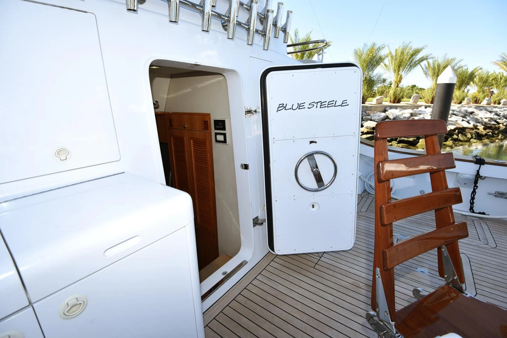 a deck with a deck and a chair on it aboard BLUE STEELE Yacht for Sale