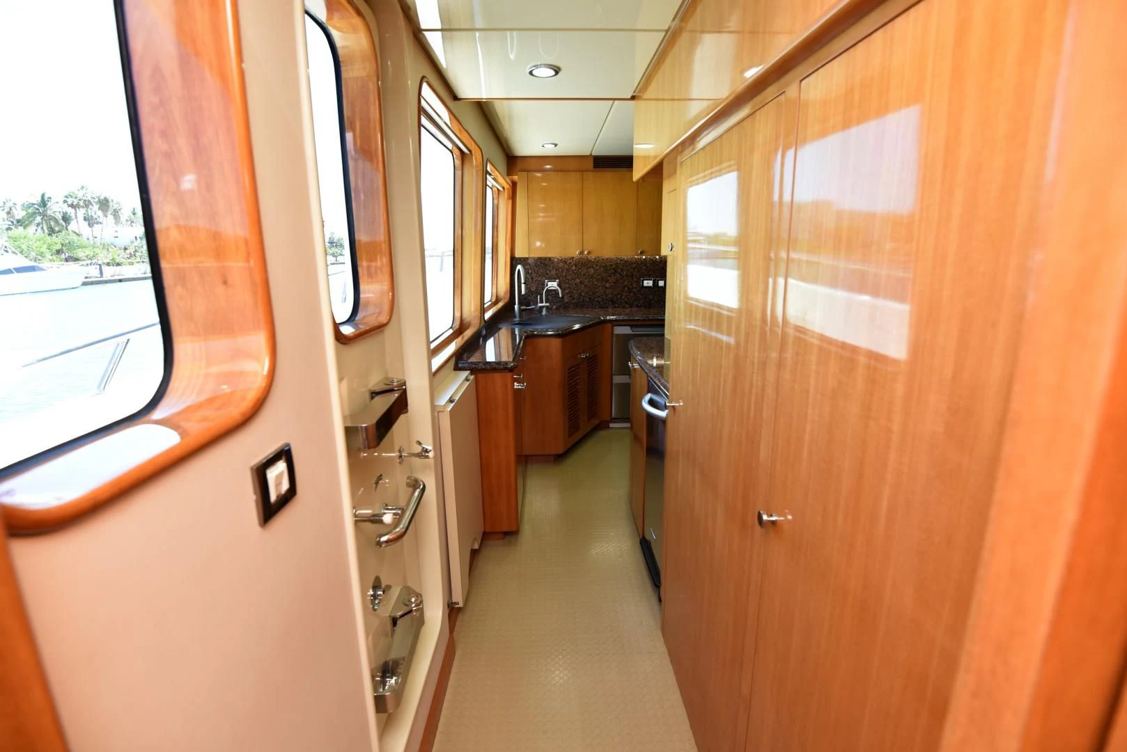 a hallway with doors and windows aboard BLUE STEELE Yacht for Sale