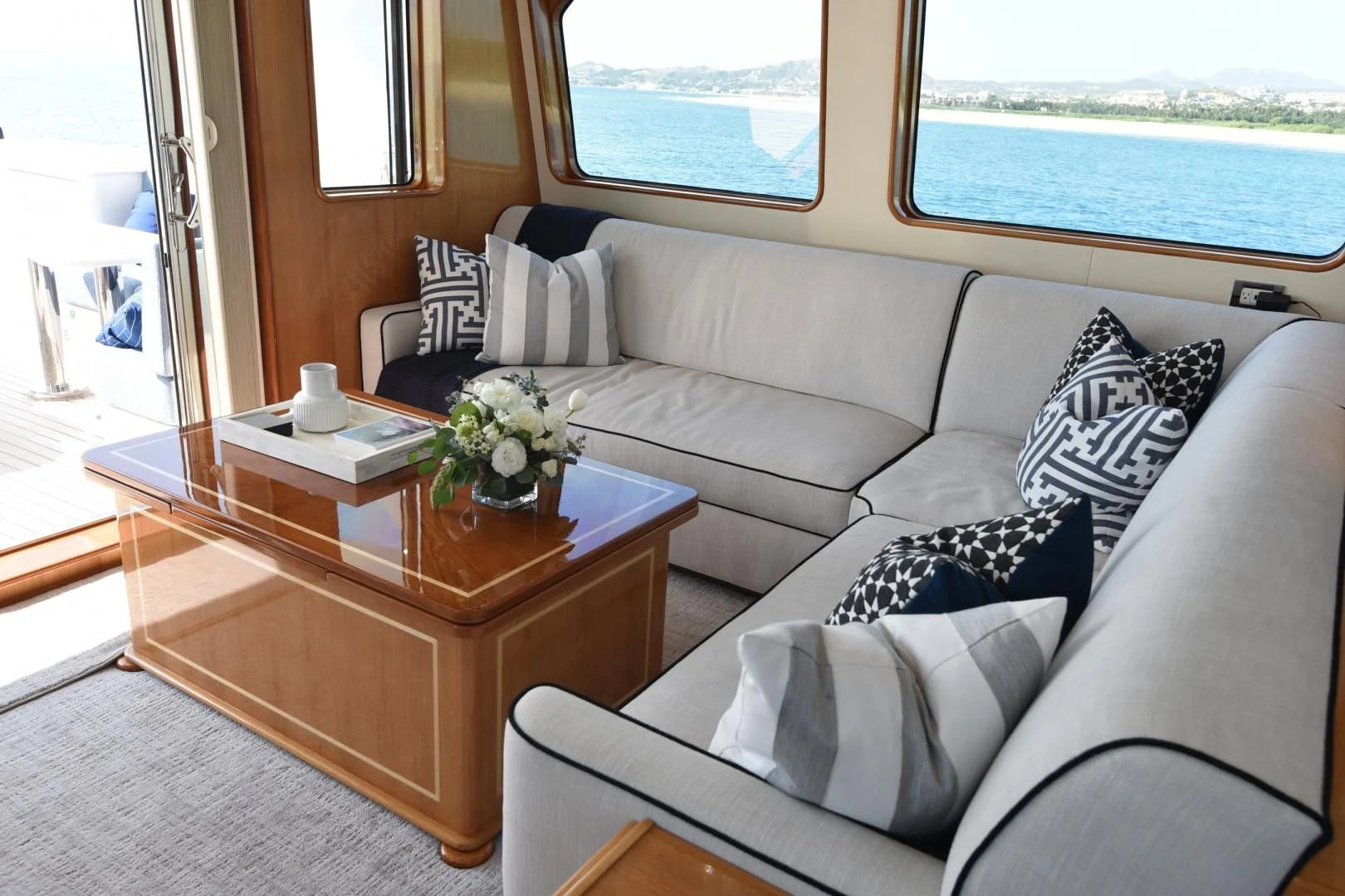 a white couch with a coffee table aboard BLUE STEELE Yacht for Sale