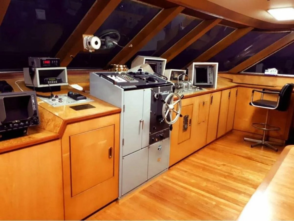 a room with a desk and computer aboard LANGKAWI LADY Yacht for Sale