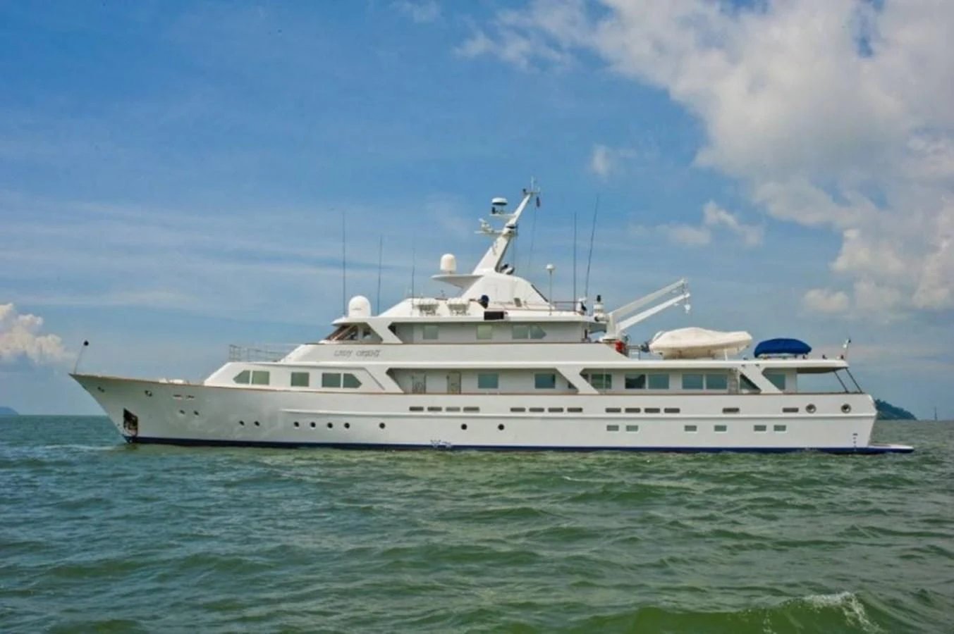 a white yacht in the water aboard LANGKAWI LADY Yacht for Sale