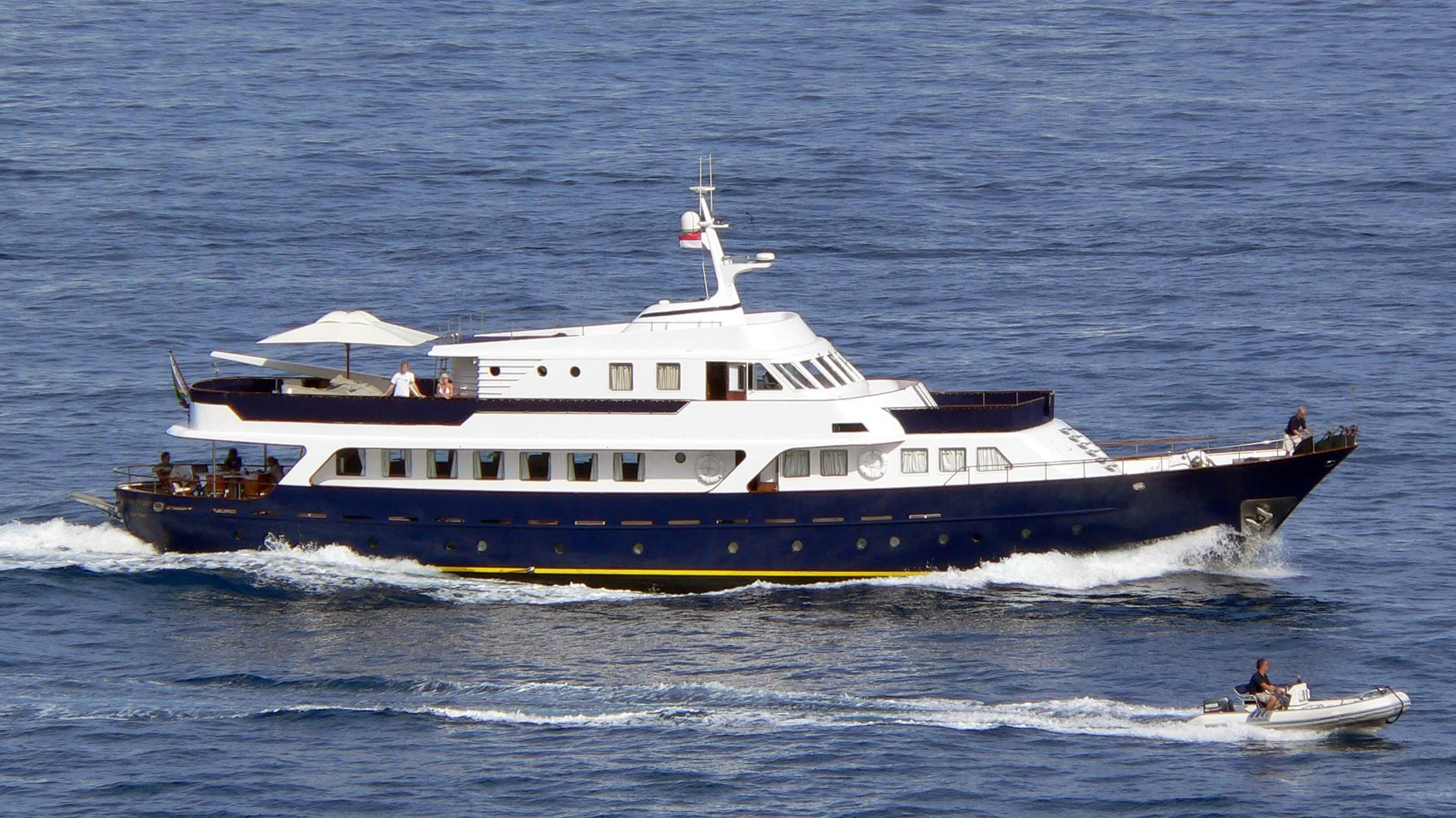 a large white boat on the water aboard DAMA DI CUORI Yacht for Sale