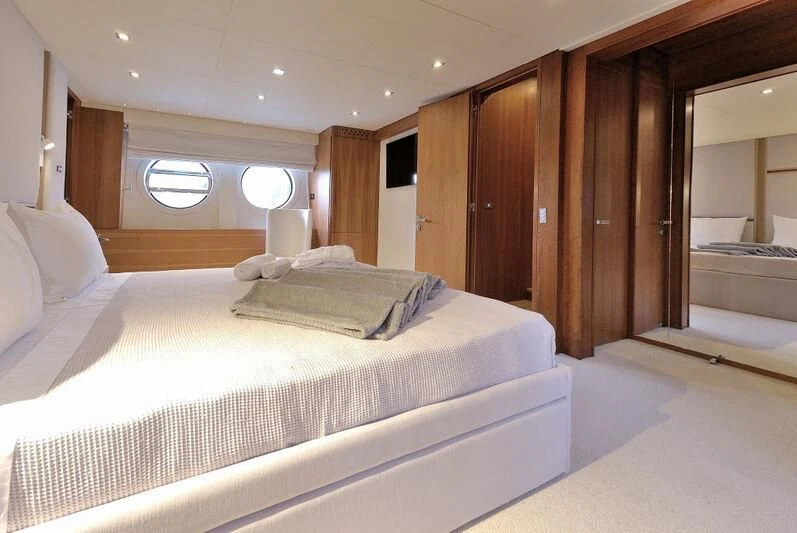 a large bed in a room aboard FUNSEA Yacht for Sale