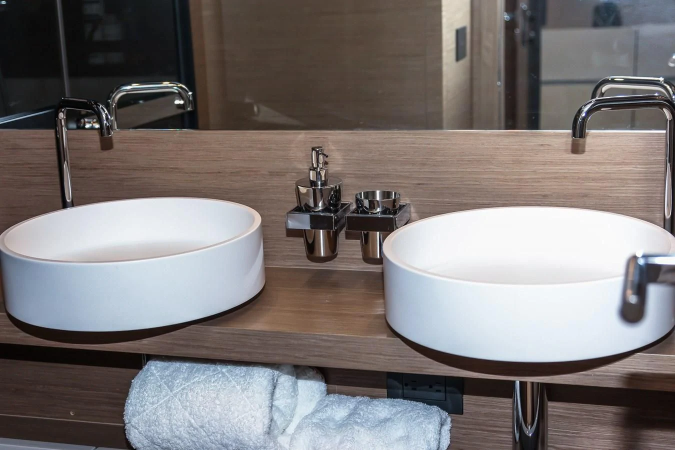 a couple of sinks in a bathroom aboard SUNSATION Yacht for Sale