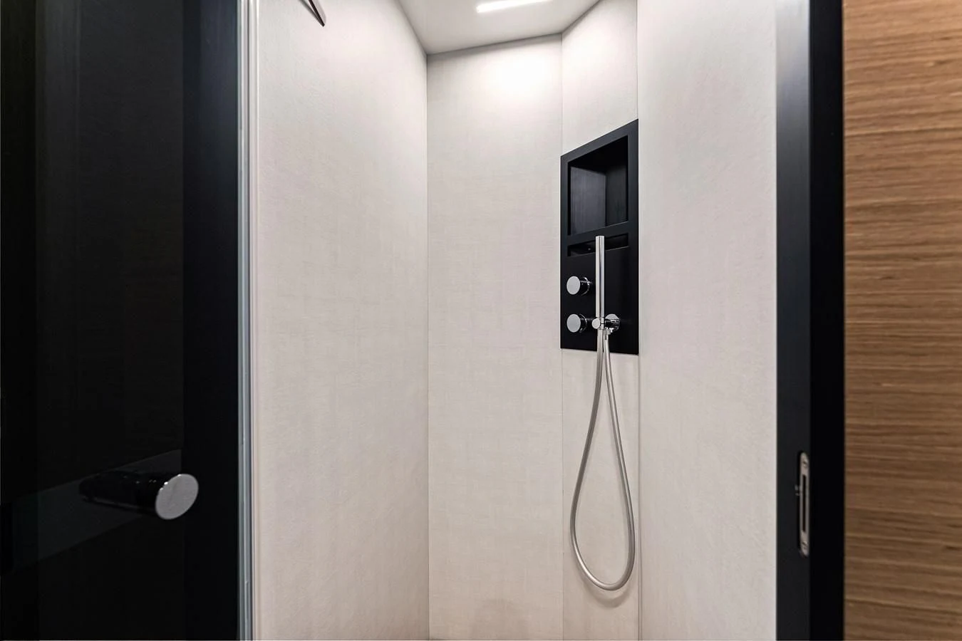 a black door with a black handle aboard SUNSATION Yacht for Sale