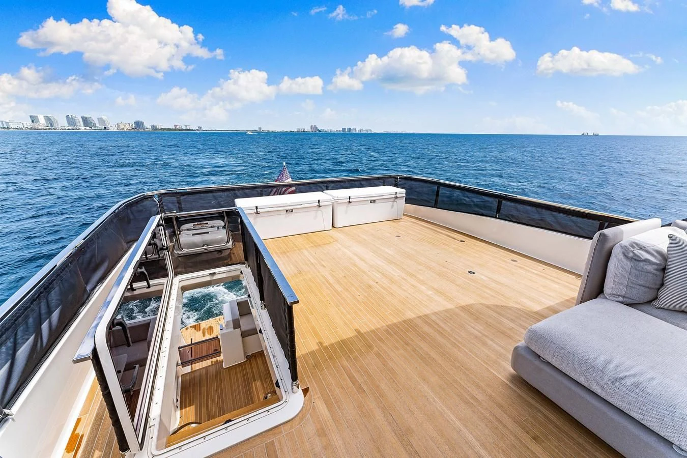 a deck overlooking a large body of water aboard SUNSATION Yacht for Sale