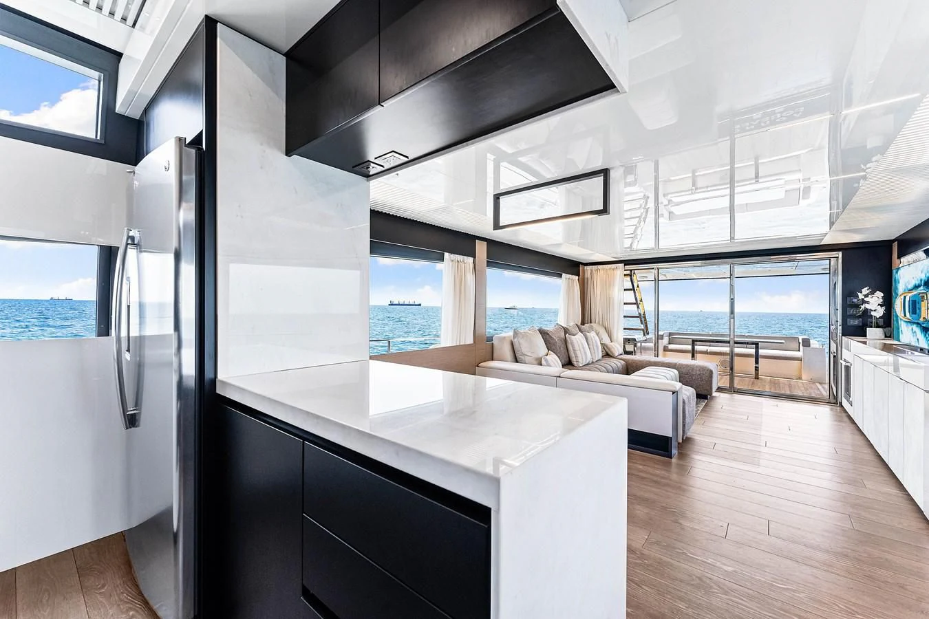 a kitchen and living room aboard SUNSATION Yacht for Sale