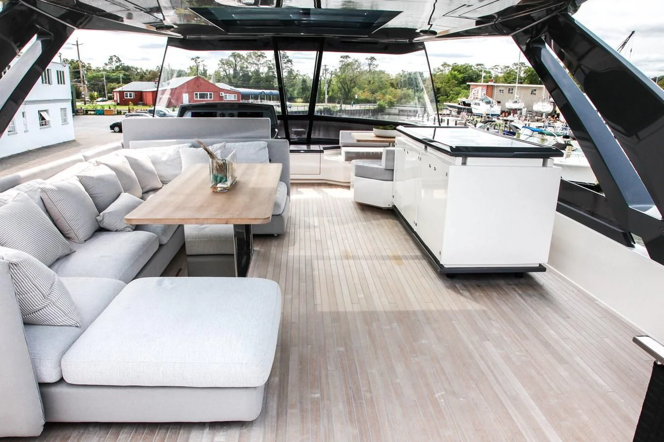a room with a couch and a table aboard SUNSATION Yacht for Sale