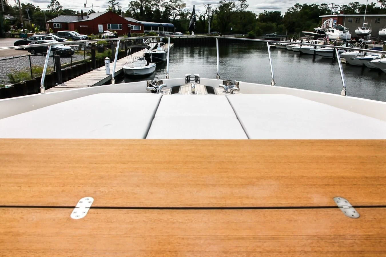 a large white pool with a water slide in it aboard SUNSATION Yacht for Sale