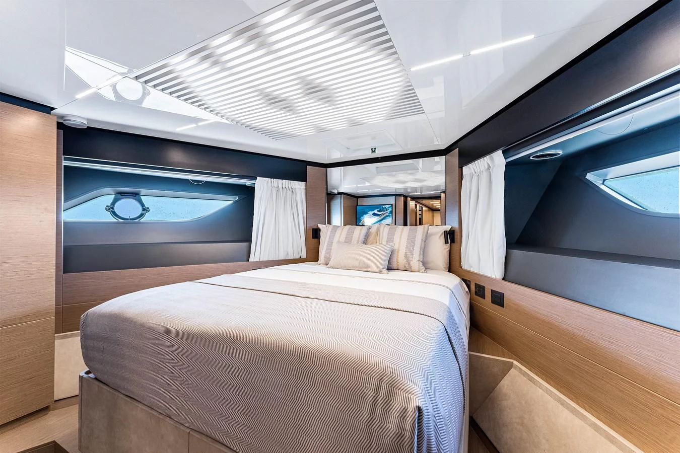 a bed in a room aboard SUNSATION Yacht for Sale