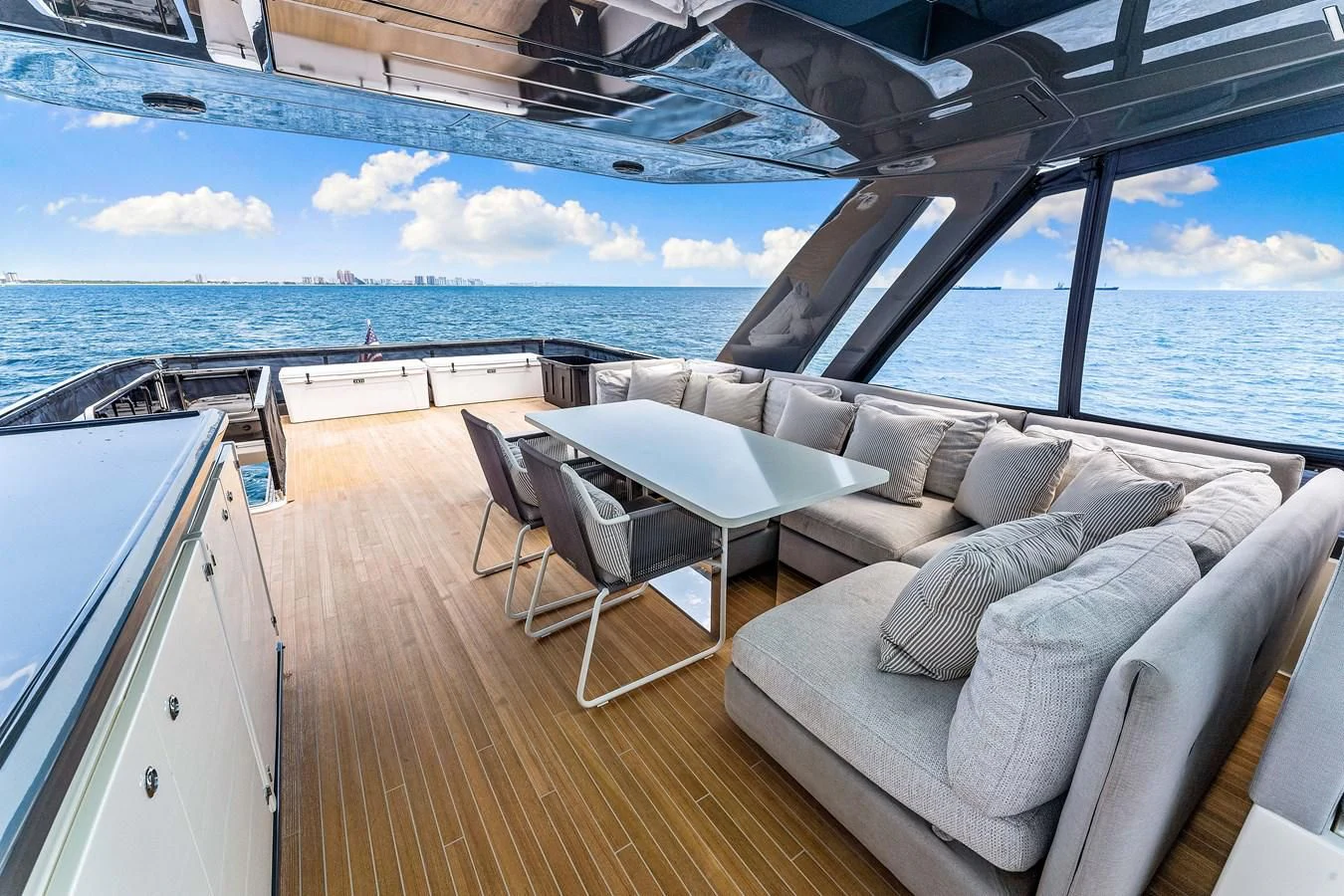 a large boat on the water aboard SUNSATION Yacht for Sale