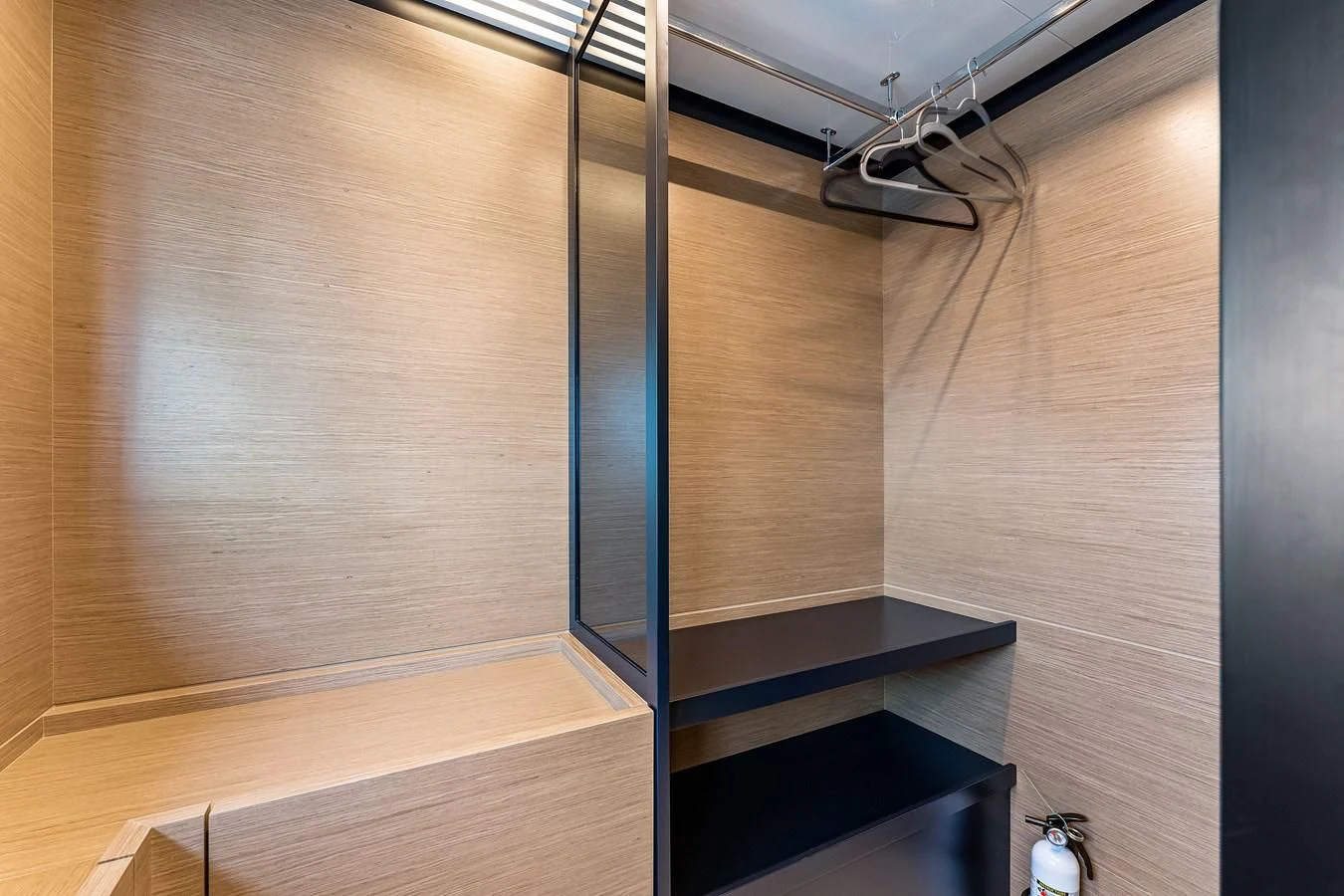 a wooden wall with a metal frame aboard SUNSATION Yacht for Sale