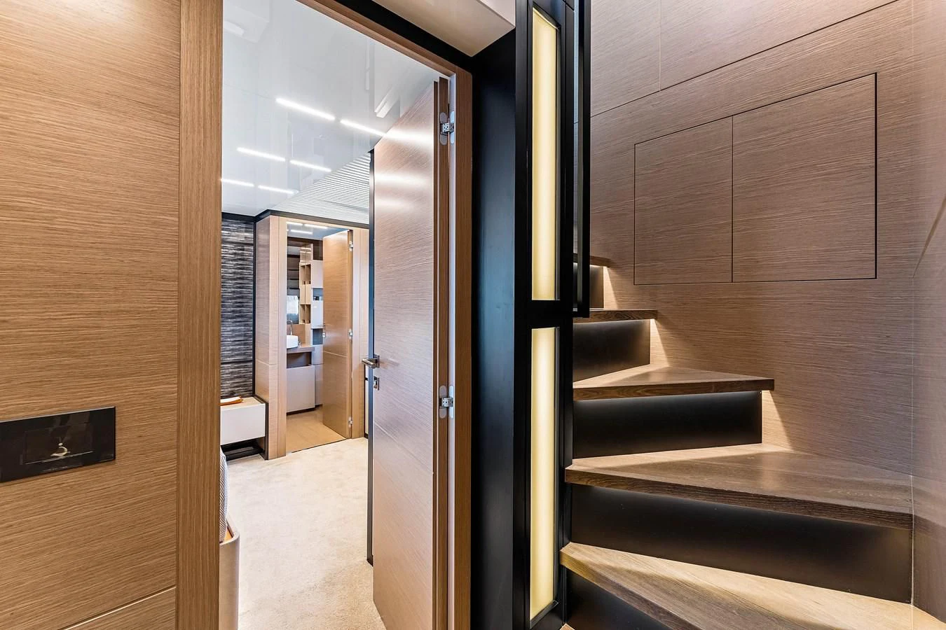 a hallway with doors aboard SUNSATION Yacht for Sale
