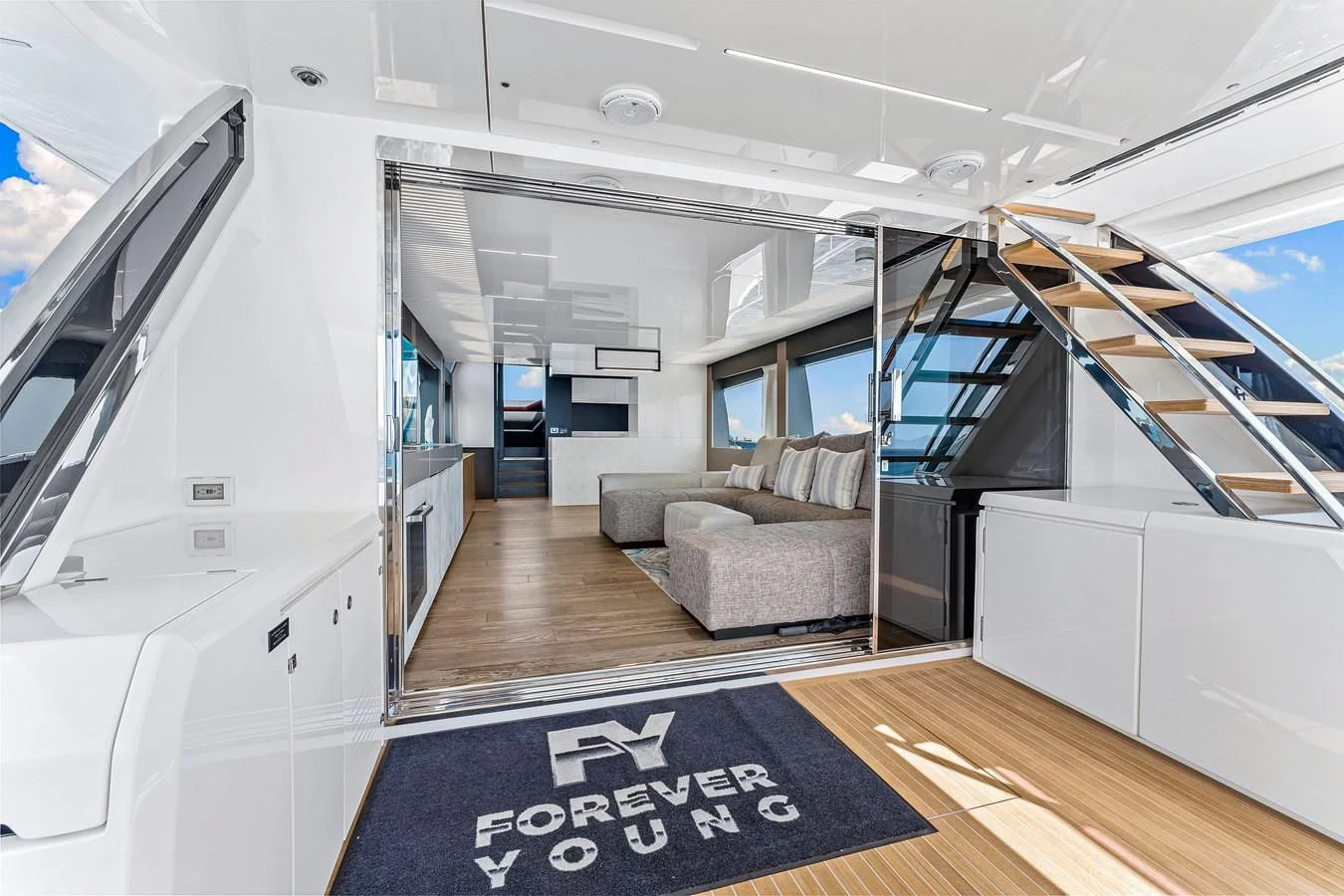 a modern looking living room aboard SUNSATION Yacht for Sale
