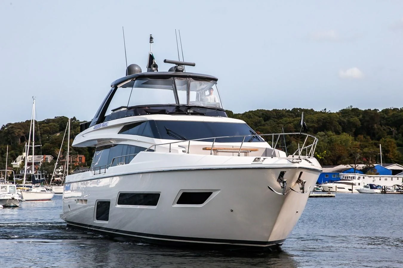 a white yacht in the water aboard SUNSATION Yacht for Sale