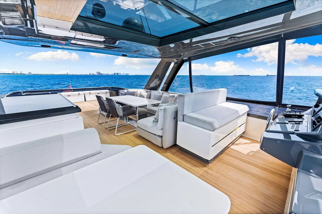 a room with a view of the ocean and the ocean aboard SUNSATION Yacht for Sale