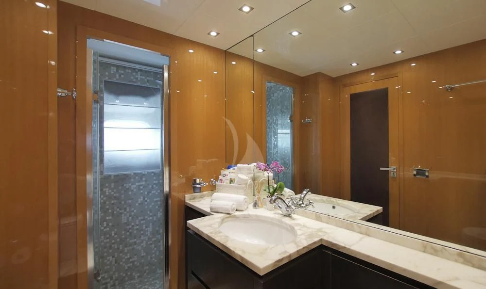 a bathroom with a large mirror aboard VILLA SUL MARE Yacht for Sale