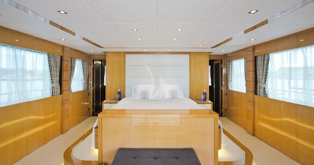 a room with a bed and a window aboard VILLA SUL MARE Yacht for Sale