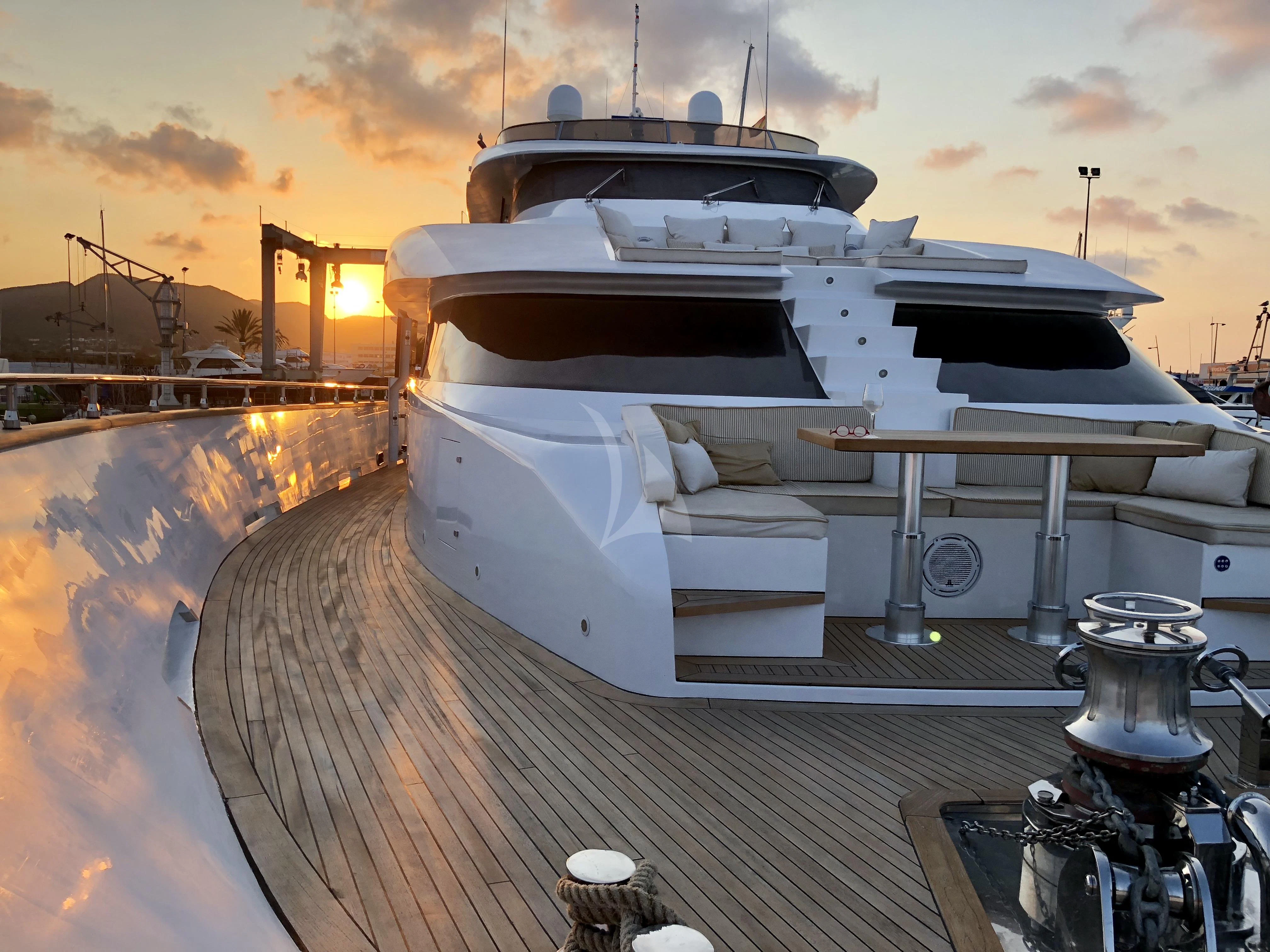 a large white ship docked at sunset aboard VILLA SUL MARE Yacht for Sale