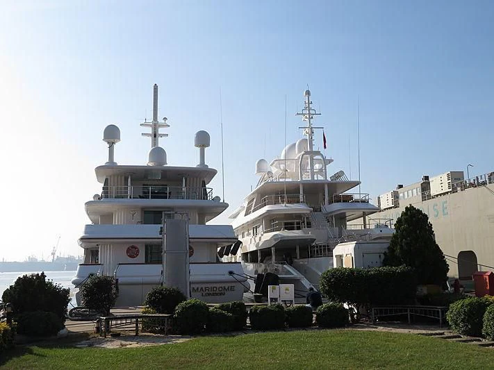 a white building with a tower aboard MARIDOME Yacht for Sale