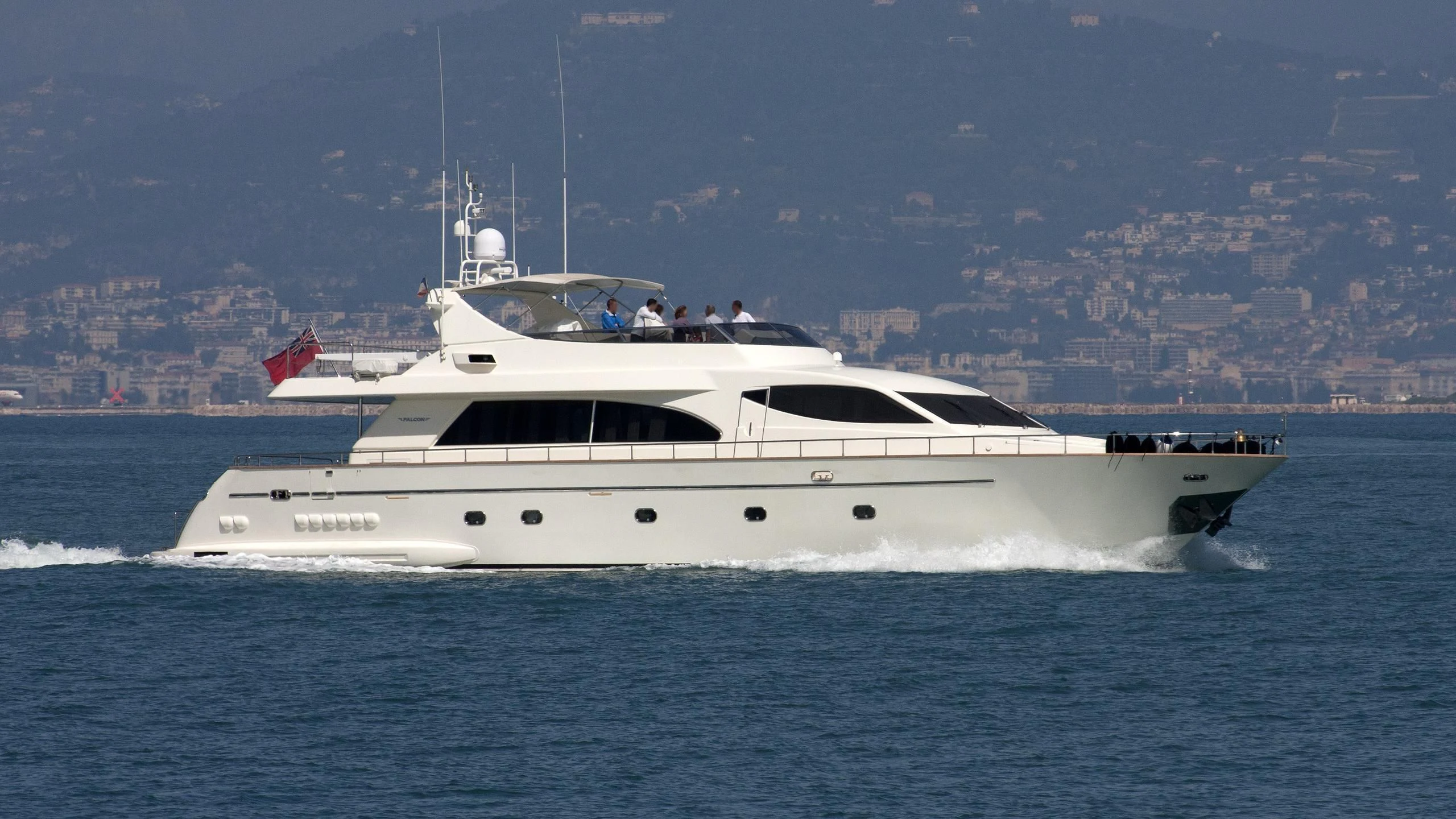 a white yacht in the water aboard BORA Yacht for Sale