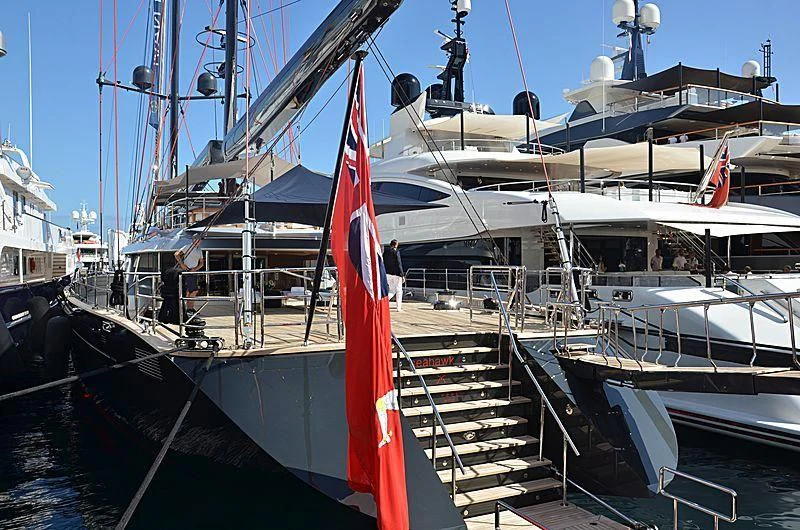 a boat with a flag on the front aboard SEAHAWK Yacht for Sale