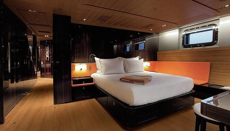 a room with a bed and a tv aboard SEAHAWK Yacht for Sale