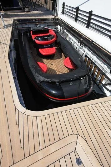 a car with luggage on a deck aboard SEAHAWK Yacht for Sale