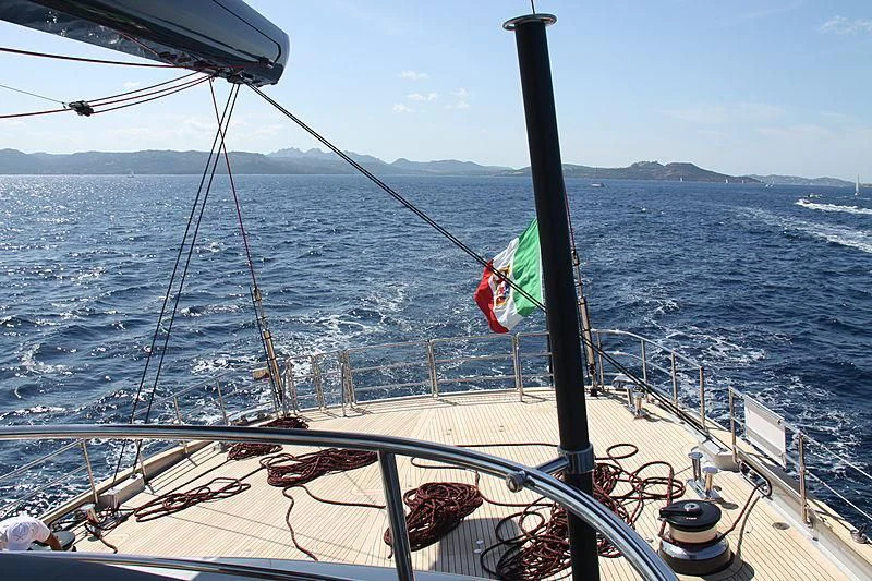 a boat with flags on it aboard SEAHAWK Yacht for Sale