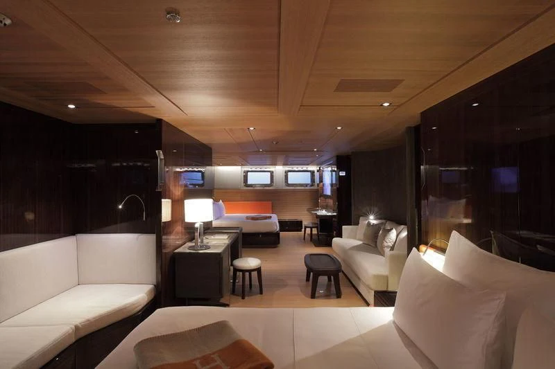 a room with a couch and a table and a television aboard SEAHAWK Yacht for Sale