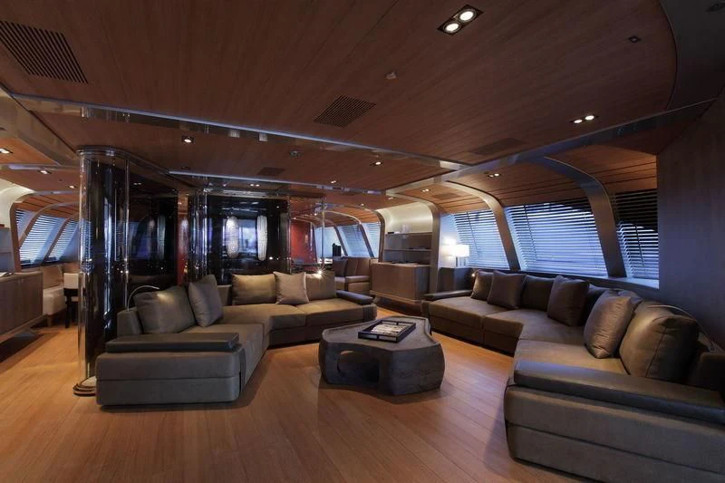 a living room with a large window aboard SEAHAWK Yacht for Sale