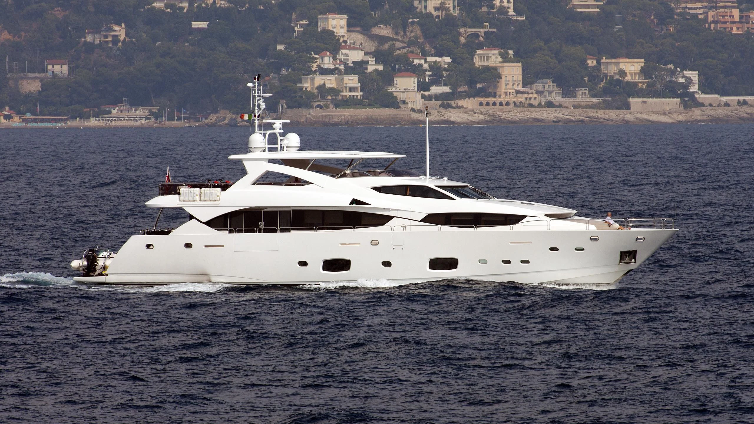 a white yacht on the water aboard FINAL CUT Yacht for Sale