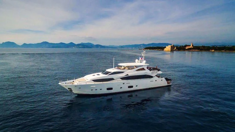 a white yacht in the water aboard FINAL CUT Yacht for Sale