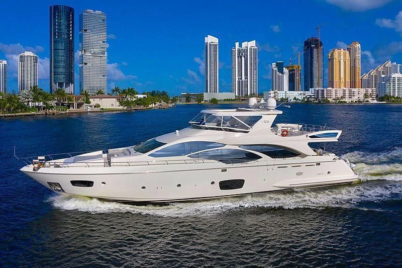 a white yacht in the water aboard BT2 Yacht for Sale