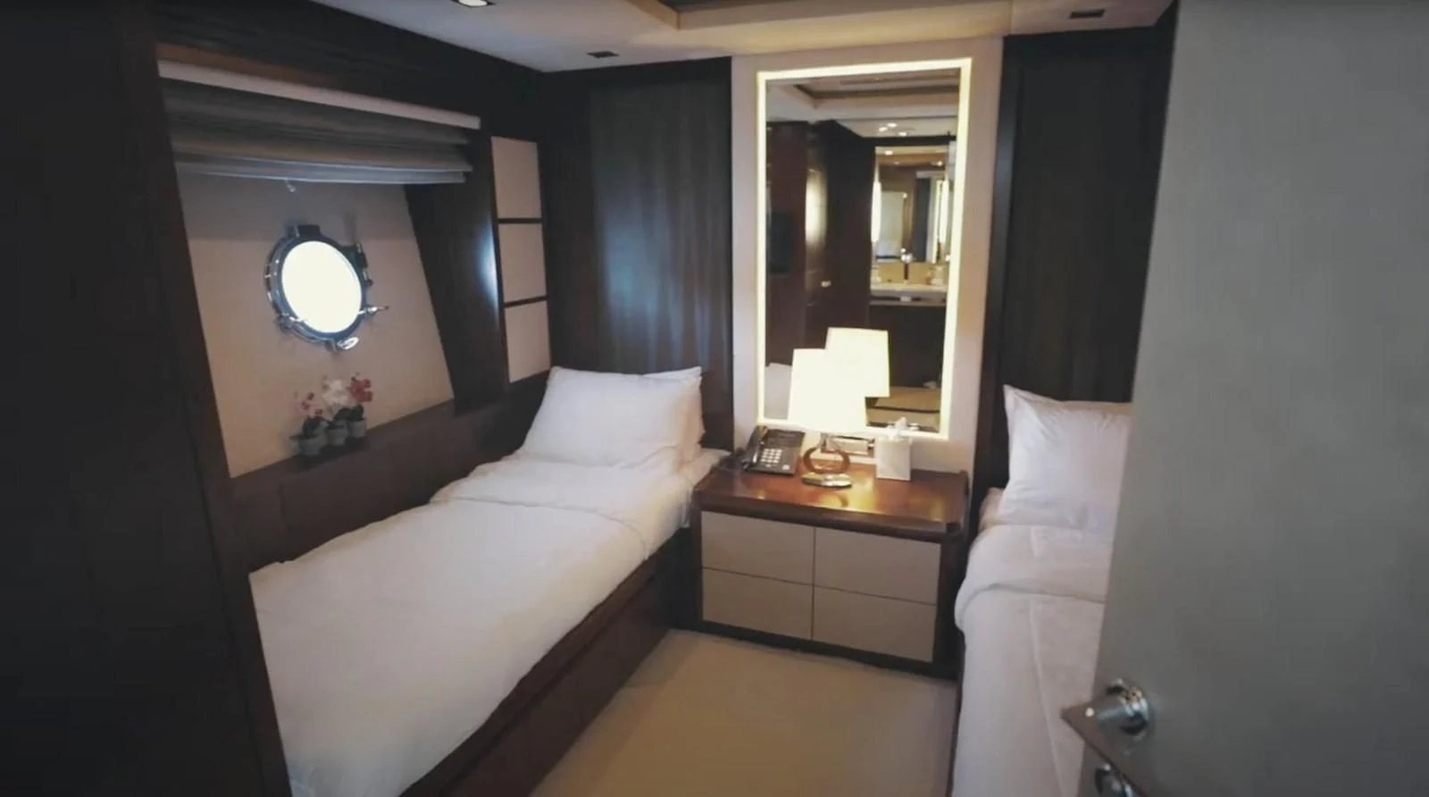 a room with two beds aboard BT2 Yacht for Sale
