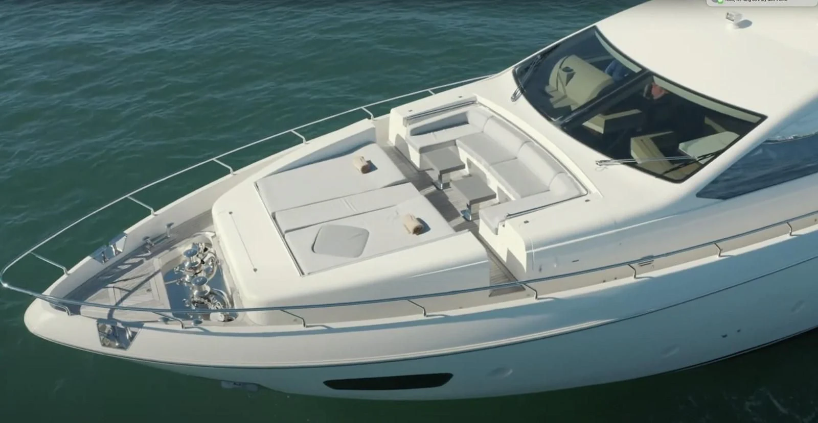 a white yacht on the water aboard BT2 Yacht for Sale