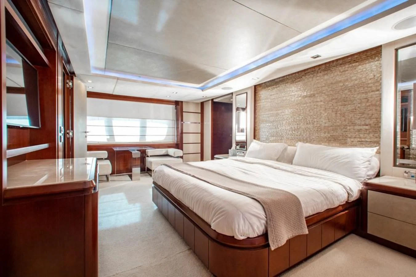 a room with a bed and a window aboard BT2 Yacht for Sale