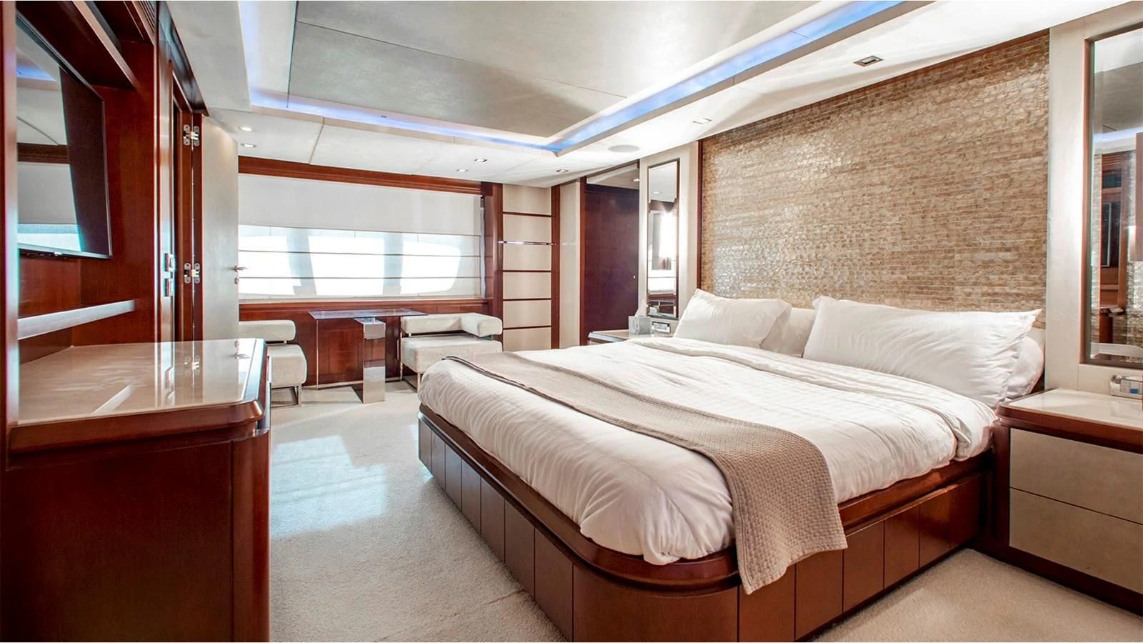a room with a bed and a desk aboard BT2 Yacht for Sale